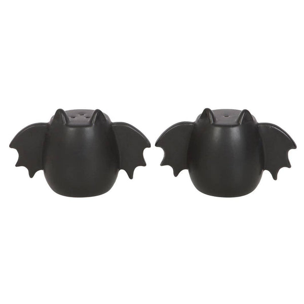 Gotische zout- en peperstrooiers in de vorm van vleermuisvleugels voor Halloween.