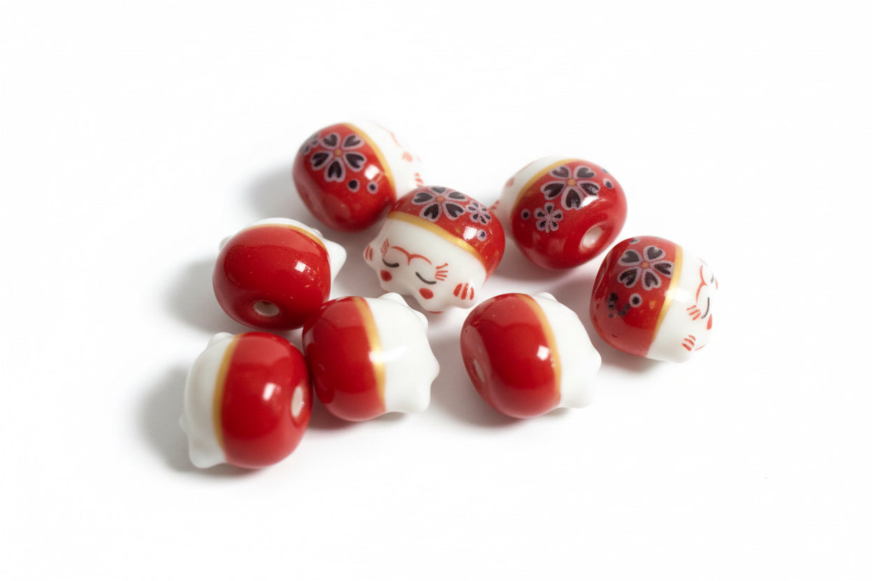 perle chat chanceux blanc et rouge