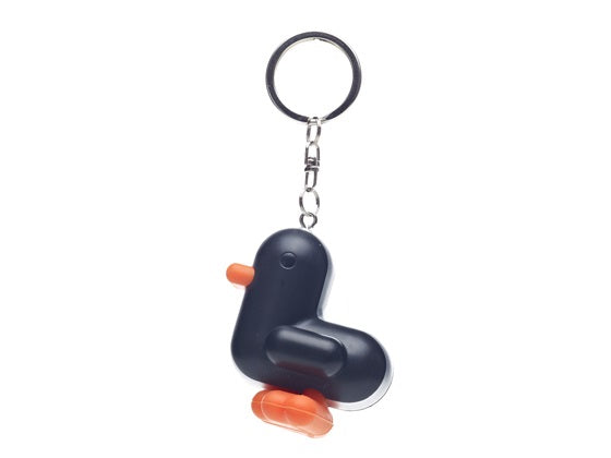 Sleutelhanger met zwarte eendjes.