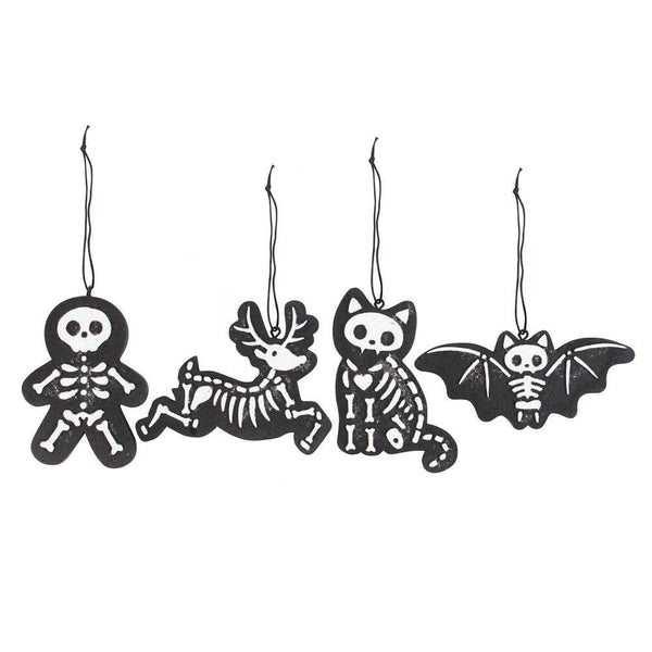 Hangende decoraties in de vorm van een peperkoekskelet