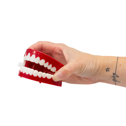 DENTS QUI CLIQUENT COMME UNE HORLOGE