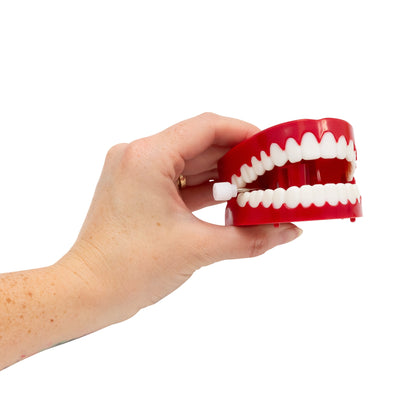 DENTS QUI CLIQUENT COMME UNE HORLOGE