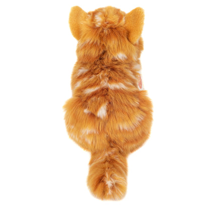 Plush ginger cat lying down