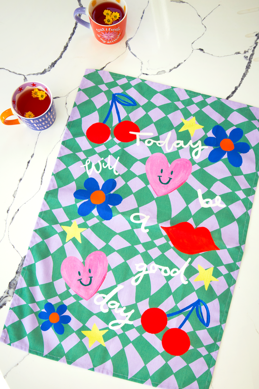 Theedoek met de tekst "Vandaag wordt een goede dag"