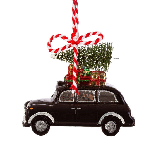 Zwarte kerstbal in de vorm van een taxi in Londen