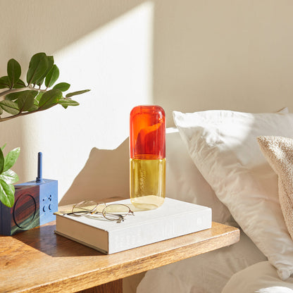Water Pill Bottle and Drinking Glass