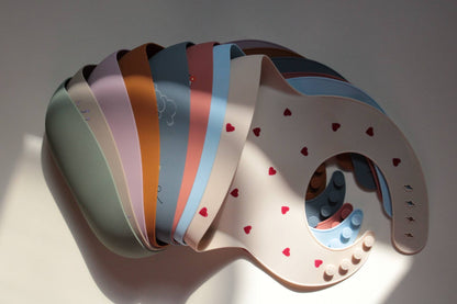 Shayan Amore siliconen slabbetje - ivoor