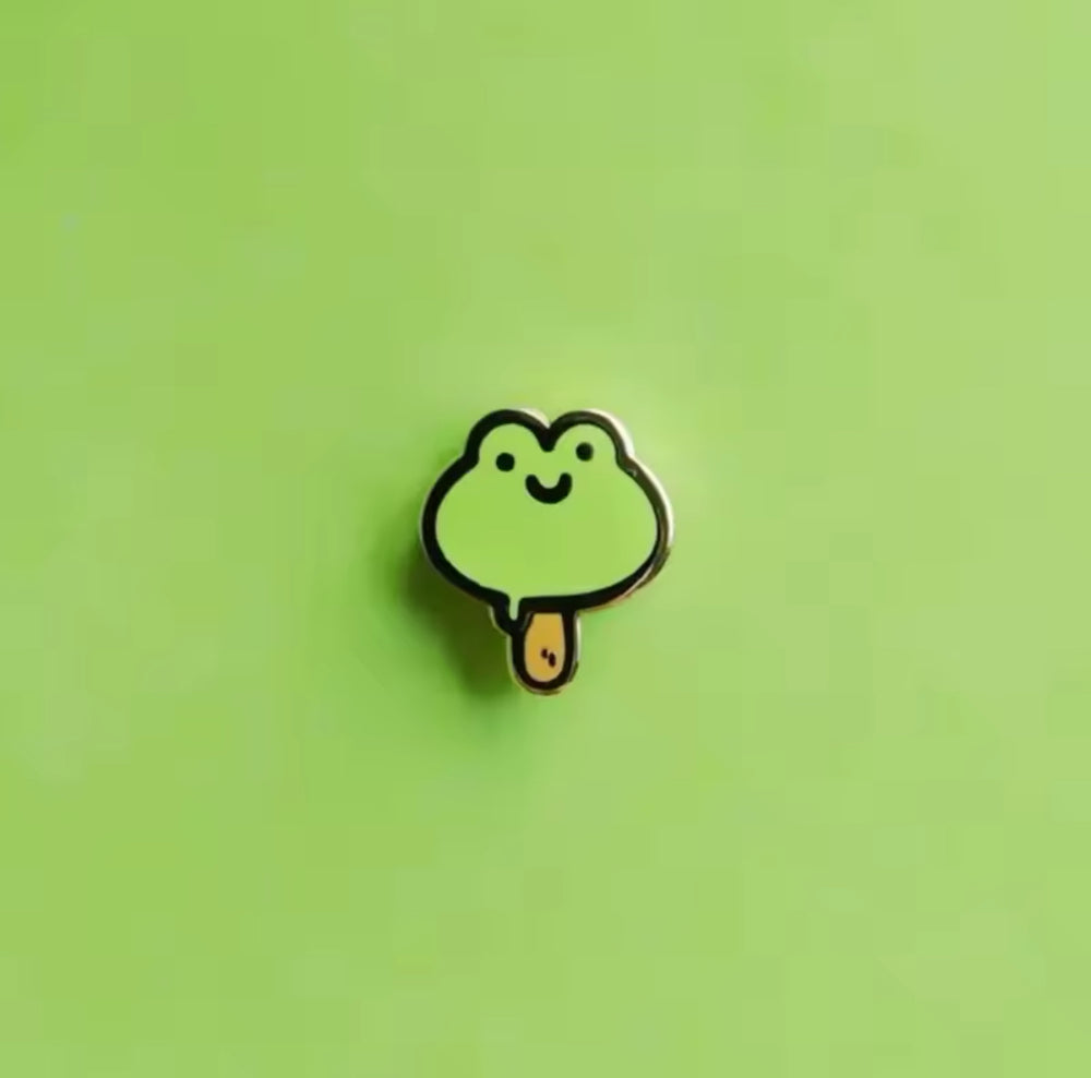 Pin's Grenouille Bâtonnet de glace