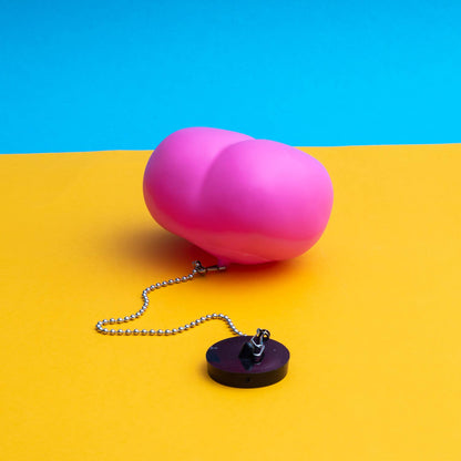 Bouchon de baignoire en forme de fesses