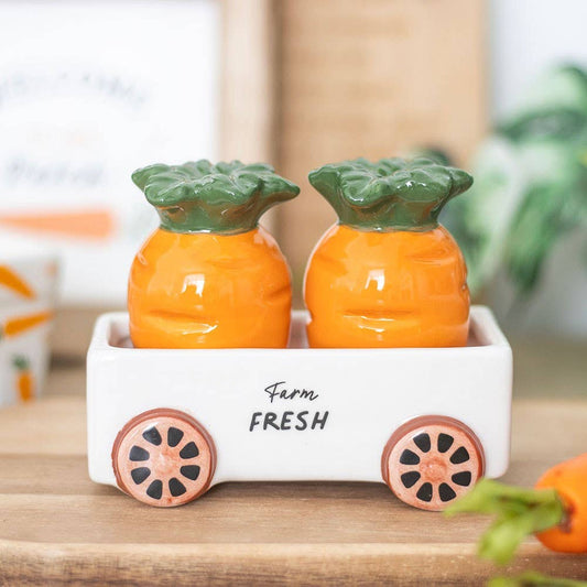 Carrot-shaped salt and pepper shakers in a trolley