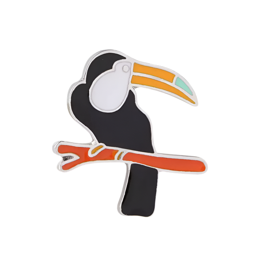 pin s toucan sur branche