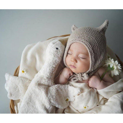Petite bouillotte en forme d'oie blanche câline