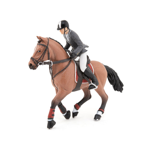 Show jumping horse and rider figurine