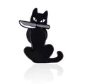 Zwarte kat speld met mes