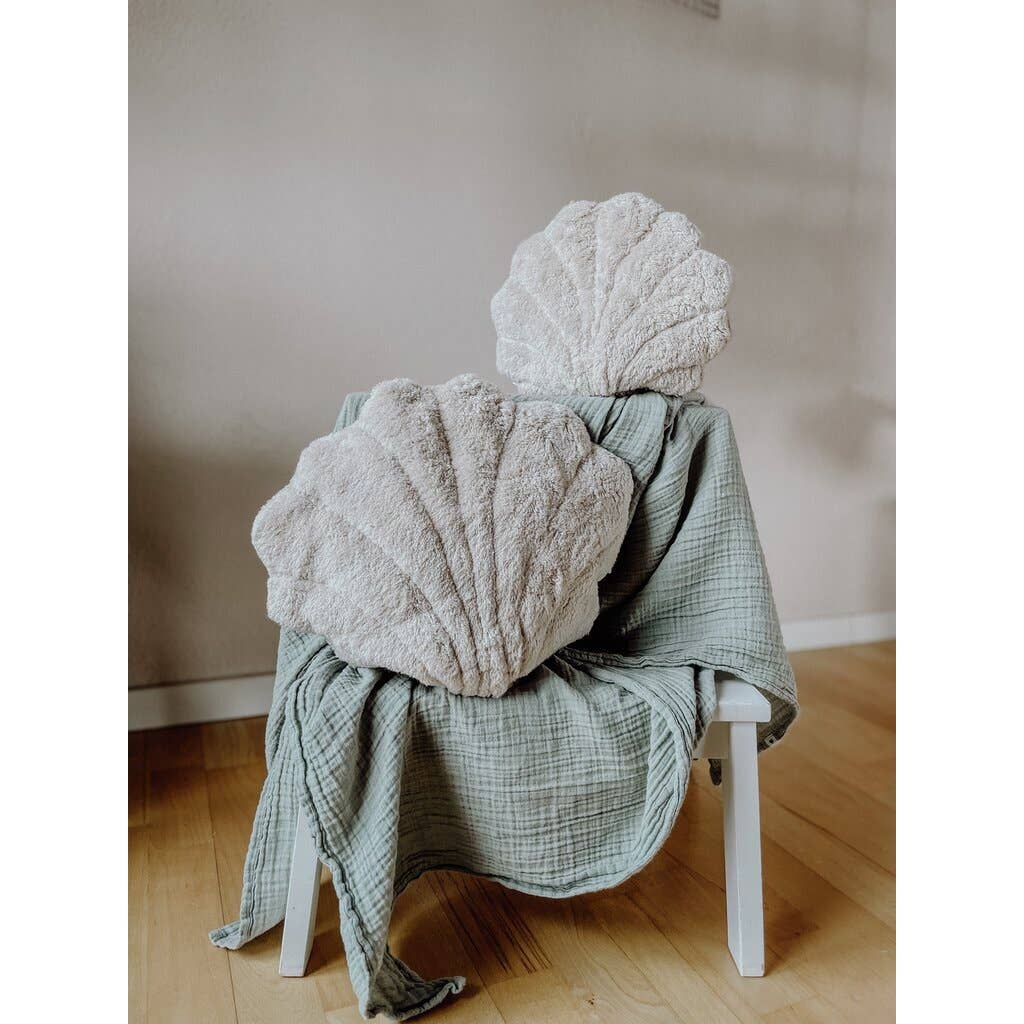 Klein verwarmingskussentje van schelp