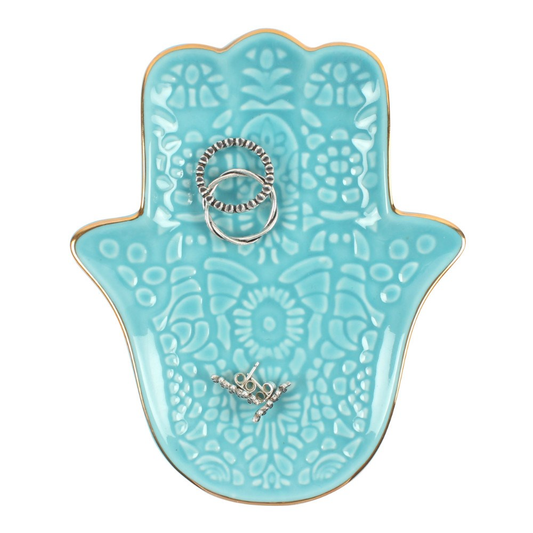 Small turquoise ceramic jewelry dish in the shape of a Hamsa hand