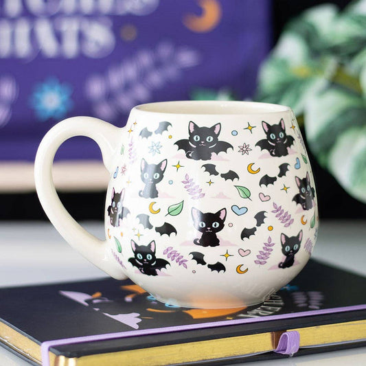 Round ceramic mug with cute and mysterious black cat designs