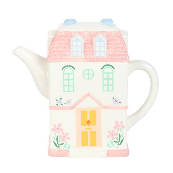 Pastelkleurige theepot in de vorm van een huis
