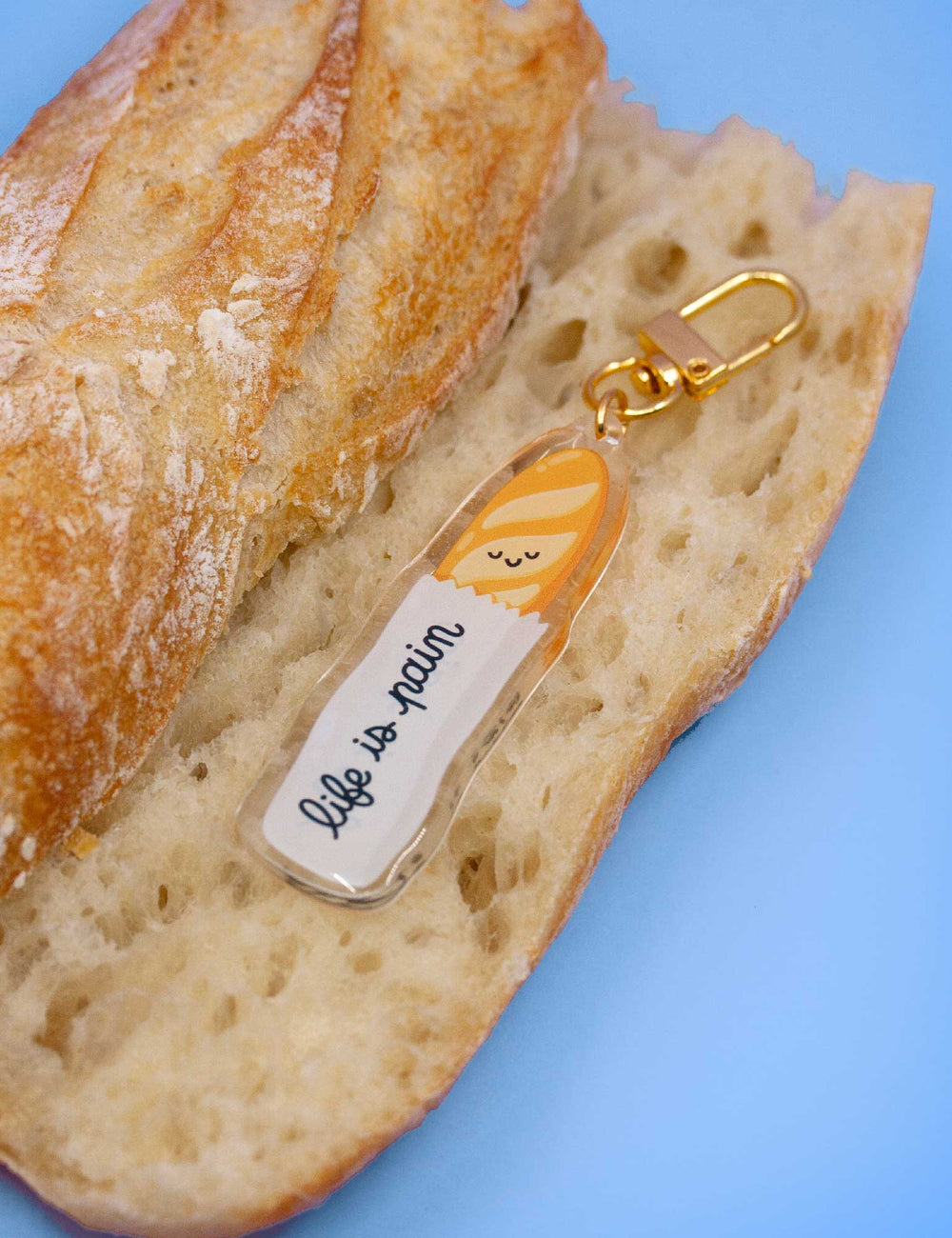 Porte Clés en Acrylique Baguette de Pain "Life is Pain"