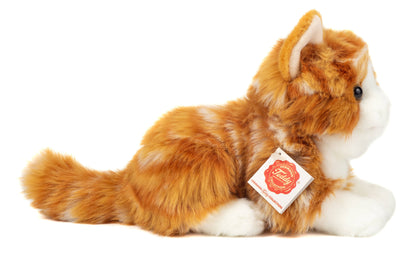 Plush ginger cat lying down