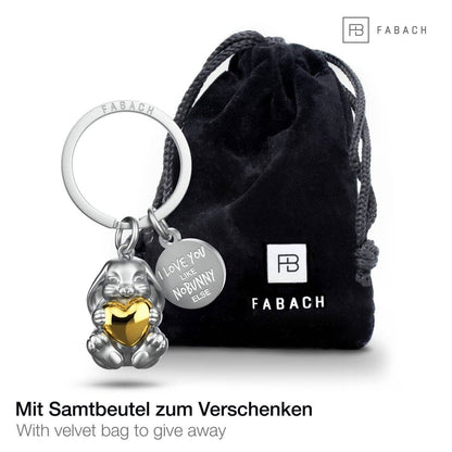 "I love you like no bunny else" bunny-shaped keychain with engraving. Cute lucky charm with a heart