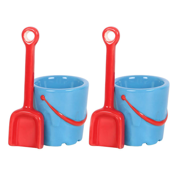 Set van 2 keramische eierdopjes in de vorm van emmertjes met lepels in de vorm van een schop.