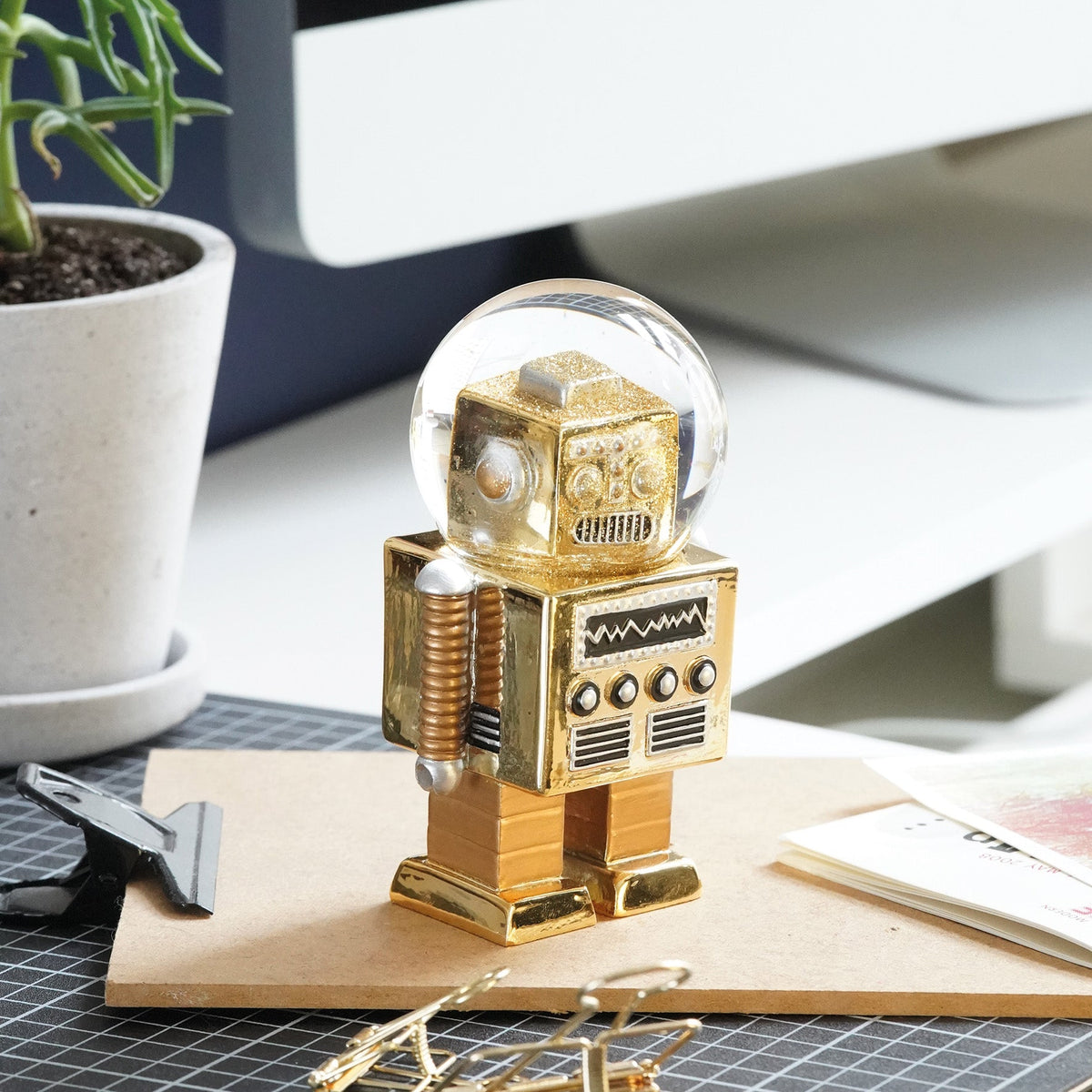 Schneekugel Roboter Gold