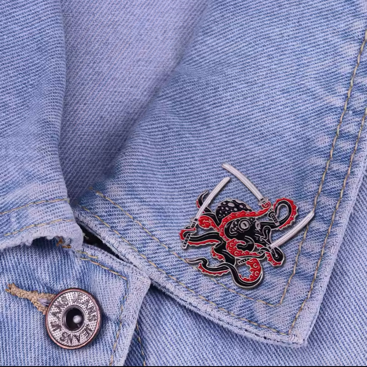 Pin's Poulpe avec Sabres
