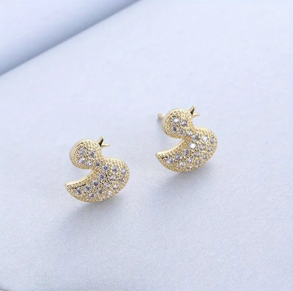 Bijpassende ketting en oorbellen met eendjes
