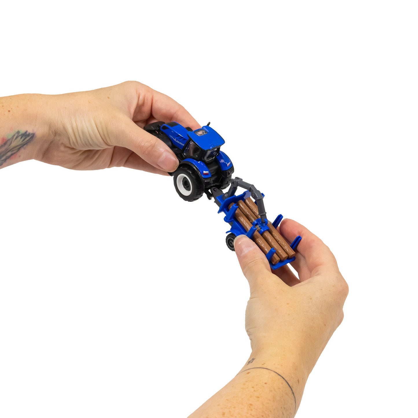 MINI MACHINES DE TRAVAIL - PACK DE 4 TRACTEURS NEW HOLLAND