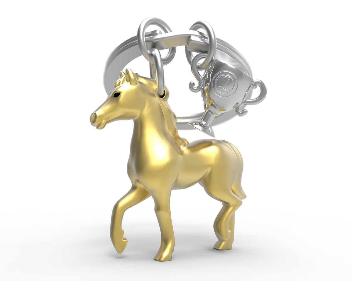 Gouden sleutelhanger met racepaardje