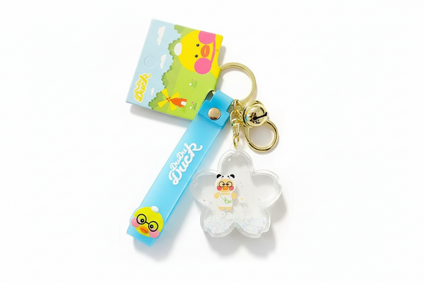 Sleutelhanger met eendje en panda-fles