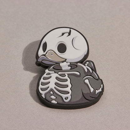 TUBBZ Numskull Skelet – glow-in-the-dark rubberen pin