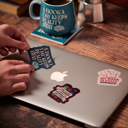 Vinyl sticker A Book A Day Keeps Reality Away