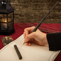 Stylo baguette avec socle & marque-page lenticulaire Sirius Black