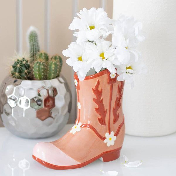 Vase aus rosa Cowboy-Stiefel