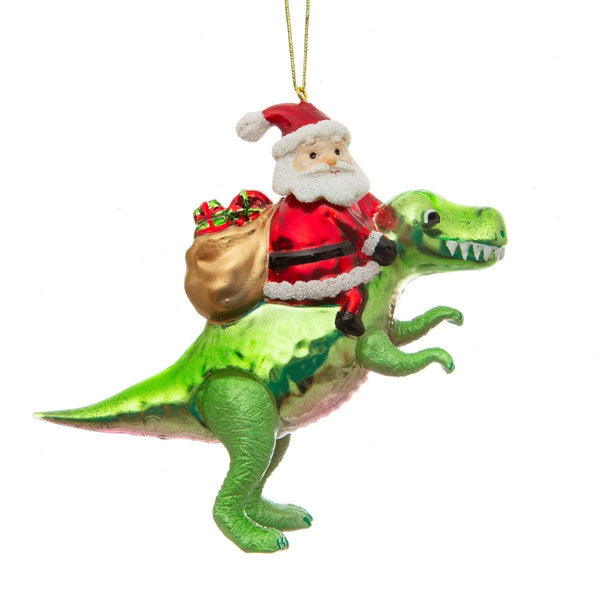 Kerstversiering met de Kerstman op een dinosaurus