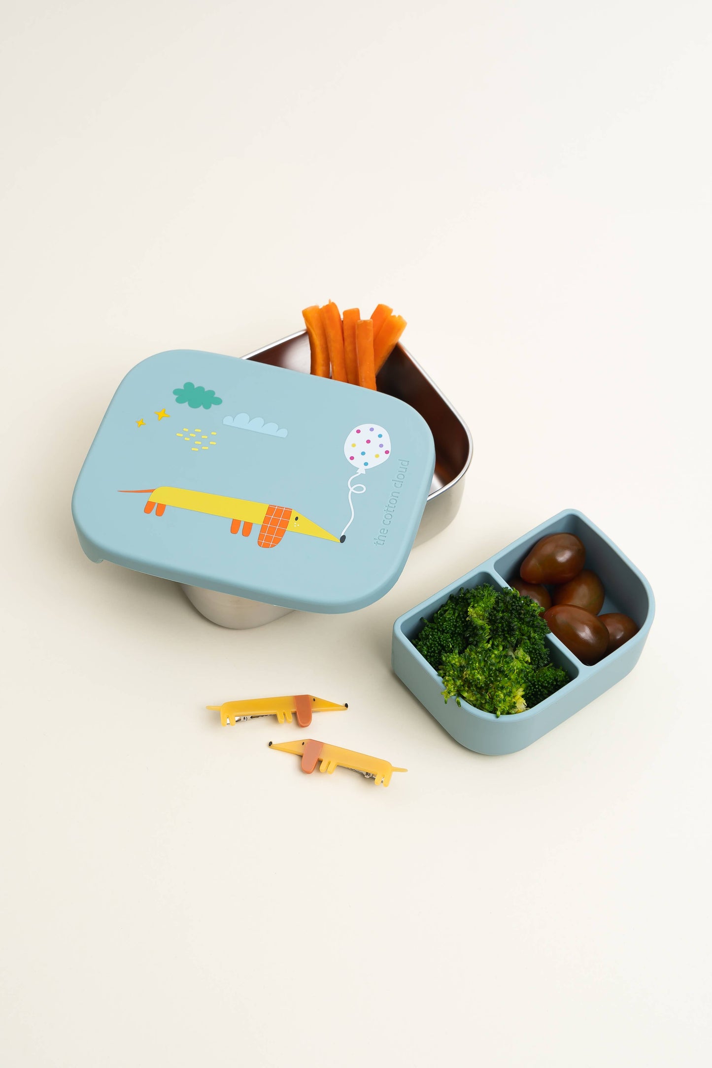 Stainless steel lunch box with compartments for children. Origami design.