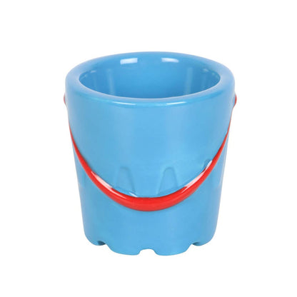 Set of 2 ceramic egg cups in the shape of buckets with spade-shaped spoons