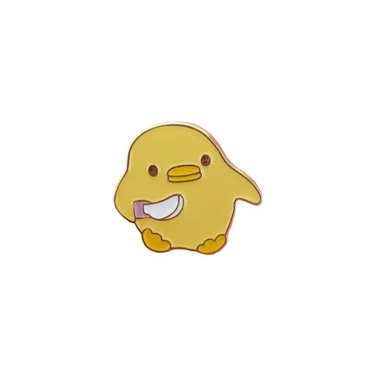 Pin’s Canard Jaune avec Couteau