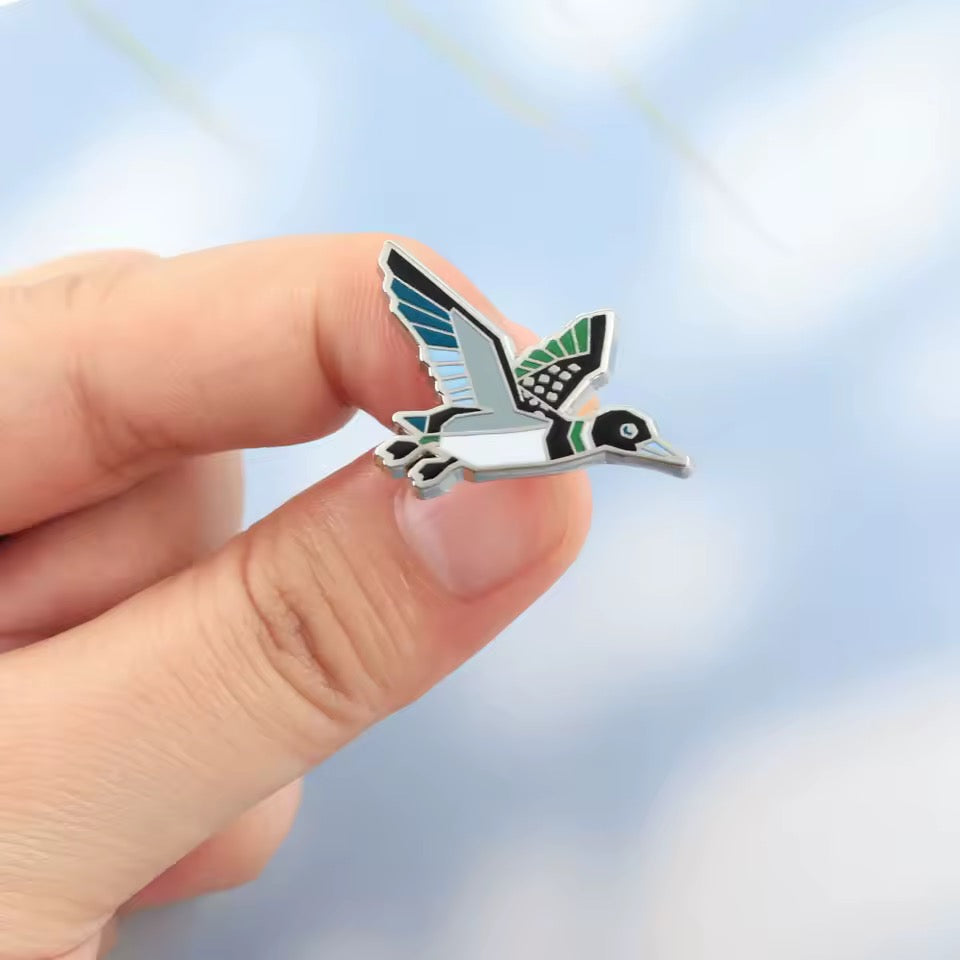 Pin’s Canard Colvert en vol