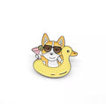 Pin’s Chien avec Bouée Canard
